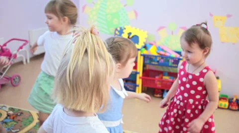 Children embrace in kindergarten 스톡 동영상 62199271