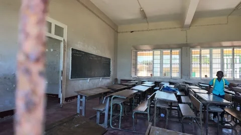 Children in an empty classrrom, Nampula Province, Island of Mozambique, Stock Footage 336742555