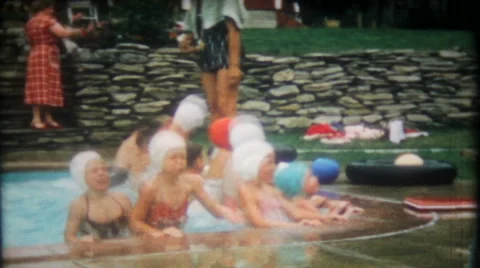 Children enjoy the backyard pool party 1950s vintage film home movie 1462 Stock Footage 45202839