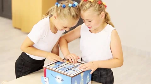 Children explore creativity through playtime with interactive toy Stock-Footage 296332206