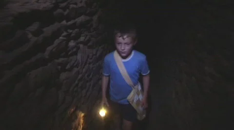 Children explore secrect tunnel Stock Footage 505961