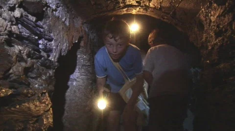 Children explore tunnel Stock Footage 413979