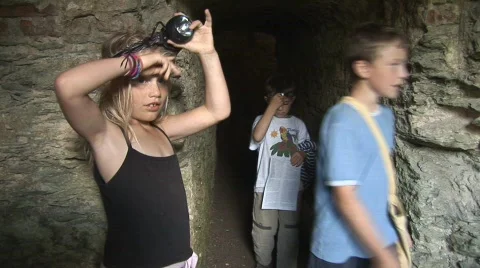 Children explore tunnel Stock Footage 506011