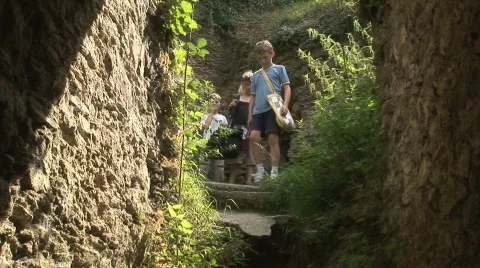 Children explore tunnel Stock Footage 506018