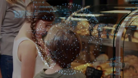 Children exploring pastry counter with code overlay and floating data points Stock Footage 309287463