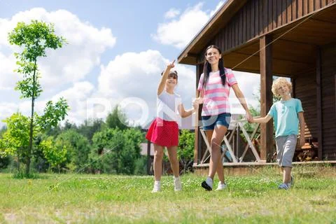 Children feeling excited while walking in countryside Stock Photos