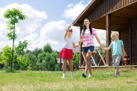 Children feeling excited while walking in countryside Stock-Fotos