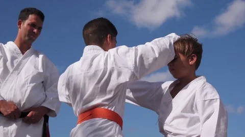 Children Fighting At Karate School With Teacher Slow Motion Stock Footage