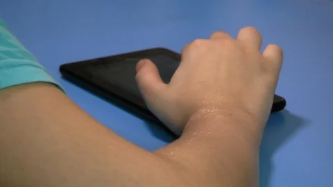 Children finger touching tablet computer touchscreen. Stock Footage 87951588