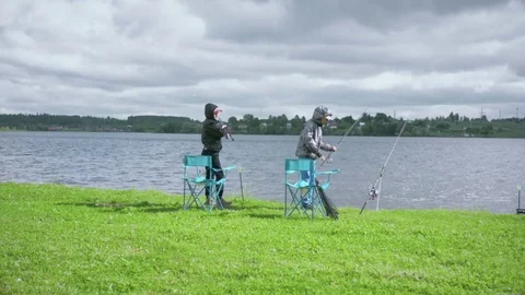 Children on fishing. Rest on the lake Stock Footage 80208853
