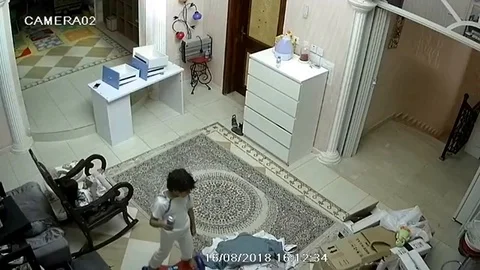 Children flee when hoverboard explodes in living room Stock Footage 106316168