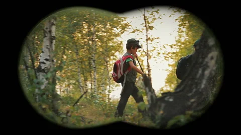 Children in forest - binoculars view 1 Stock Footage 60477574