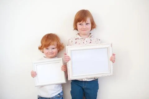 Children with frames in their hands Stock Photos