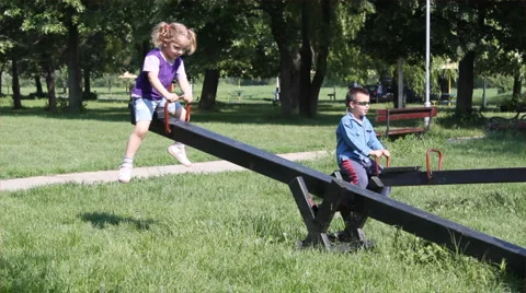 Children fun on seesaw Video stock 5502791