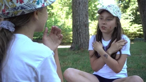 Children Girls on Playground clapping hands counting game Stock Footage