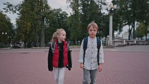Children go back to school. Cute pupils with backpacks Stock Footage 161248475