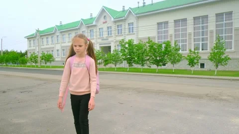 Children go back to school. Cute pupil with backpacks. Back to school concept. Stock Footage 278052697