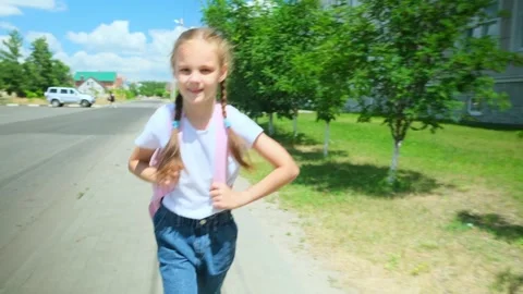 Children go back to school. Cute pupil with backpacks. Back to school concept. Stock Footage 279655406
