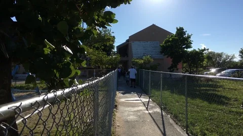 Children Going to Walter Parker Primary School in Morning, Freeport Bahamas Stock Footage 95451871
