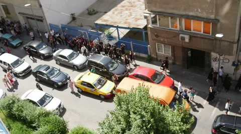 Children graduating high school walking in the streets Stock Footage 51074358