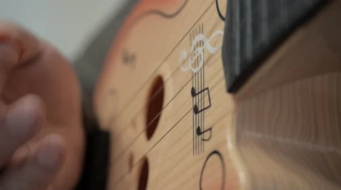 Children guitar. Closeup of the strings. Stock-Footage 41698872