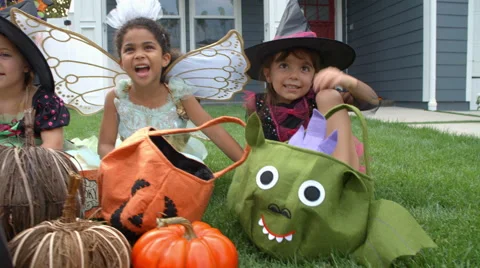Children In Halloween Costumes Trick Or Treating Shot On R3D Stock Footage