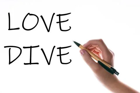Children hand with pen write on an blue white background. Writing hand. Word Stock Photos
