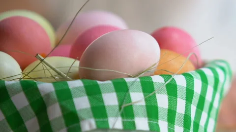 Children hands drawing colorful patterns on egg, home preparation for Easter Stock Footage 99719605