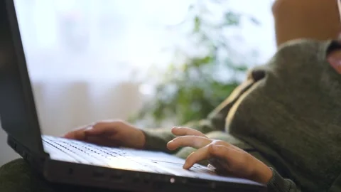 Children hands typing keyboard. close-up. boy studying remotely at home. Stock Footage 233523965