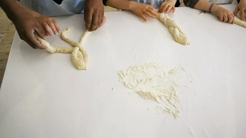 Children hands view from above preparing bread dough Video stock 111340122