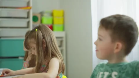 Children have fun in class and want to go to recess. Stock Footage 247110702