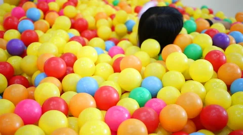 Children have fun with multicolor ball Stock Footage 52519717