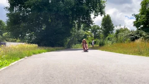 Children have fun riding a skateboard Stock Footage 247447953