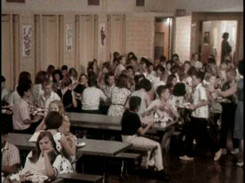 Children have lunch type A in the school cafeteria in 1966. Stock Footage 75293702