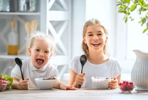 Children having breakfast Stock Photos