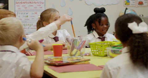 Children having a discussion in classroom Stock Footage 58574018