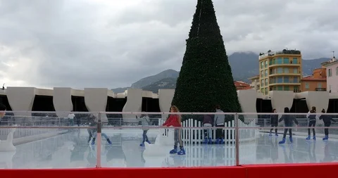 Children Having Fun On An Outdoor Skating Rink In The Christmas Market Of Men Stock Footage 121661806