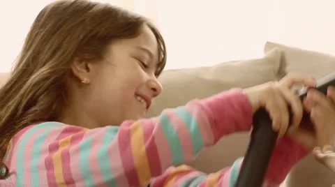 Children having fun playing with vacuum cleaner. Stock Footage 22921287