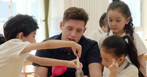 Children having science class in kindergarten classroom,4K Stock Footage 146868782