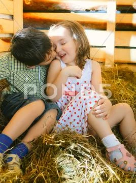 Children on hayloft Stock Photos