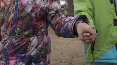 Children holding hands Stock Footage 120288239
