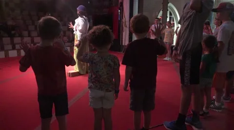 Children interacting with clown Stock Footage 41308066