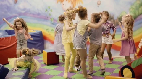 Children jumping in the playroom Stock Footage 71718430