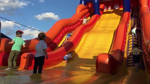 Children jumping on a trampoline 库存影片 88435384