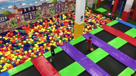 Children jumping on a trampoline Stock Footage 88436202
