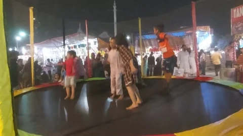 Children jumping  on trampoline Stock Footage 171348331