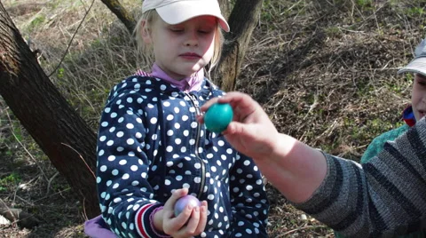 Children Knock Eggs For Easter Stock Footage 62777505