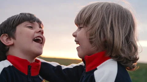 Children laugh heartily happy smiling Stock Video Pond5