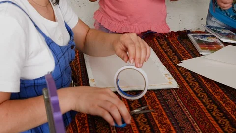 Children learn to draw. they're preparing for a drawing lesson Stock Footage 124841871