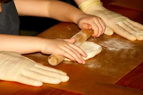 Children learn to work with text in a cooking class. Stock Photos